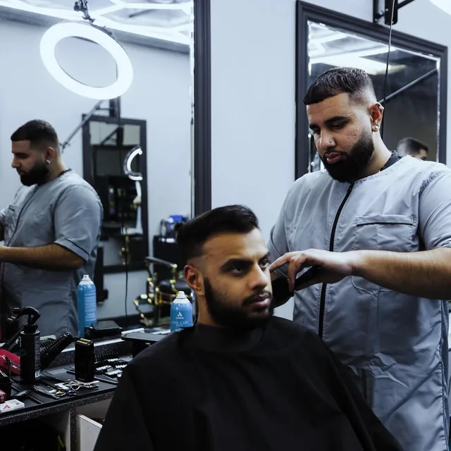 Furious Fades barbers working on clients in the shop